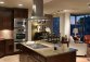 Glamorous-contemporary-kitchen-set-with-living-room-design-without-bulkhead-wall-in-Washington-DC-luxury-apartments.jpg